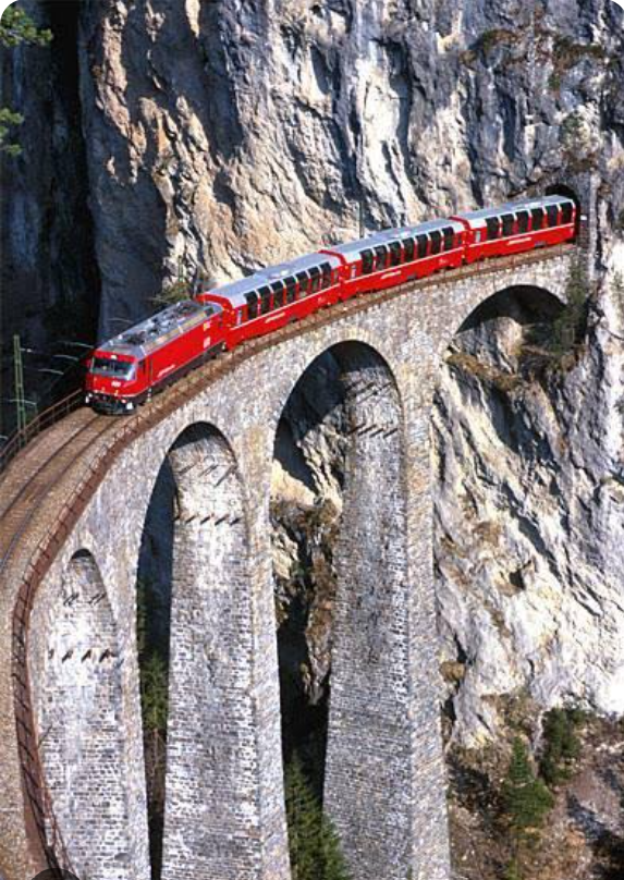 Bernina Express train travelling through the Swiss Alps